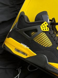 aj4 black yellow reps