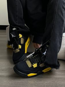 aj4 black yellow reps